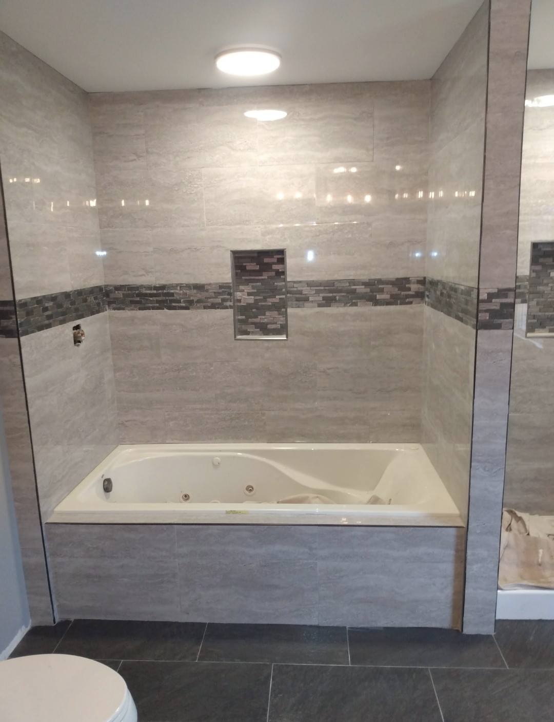 Custom tiled bathtub surround