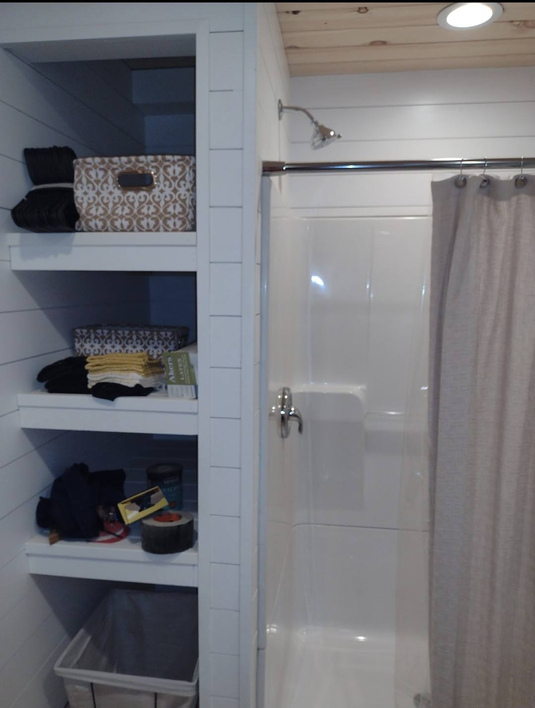 Cabin bathroom with built-in shelving