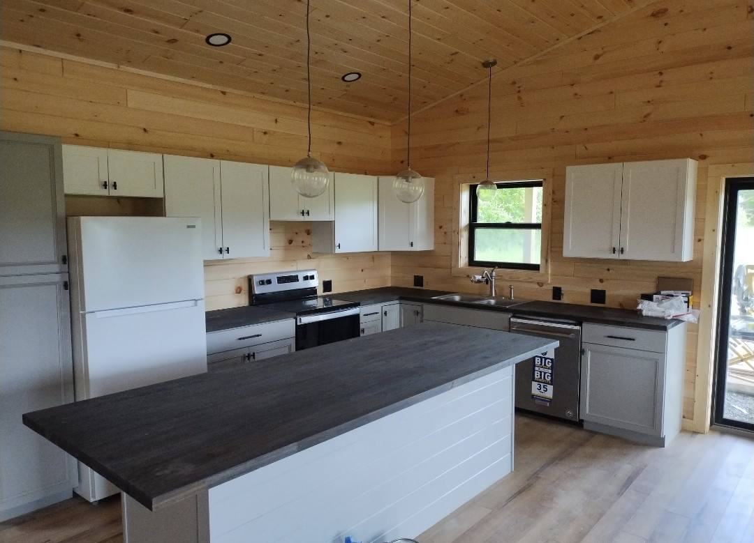 Custom kitchen with pine ceiling